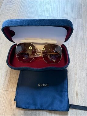 Gucci Men’s Gold Frame Sunglasses with Brown Gradient Lenses